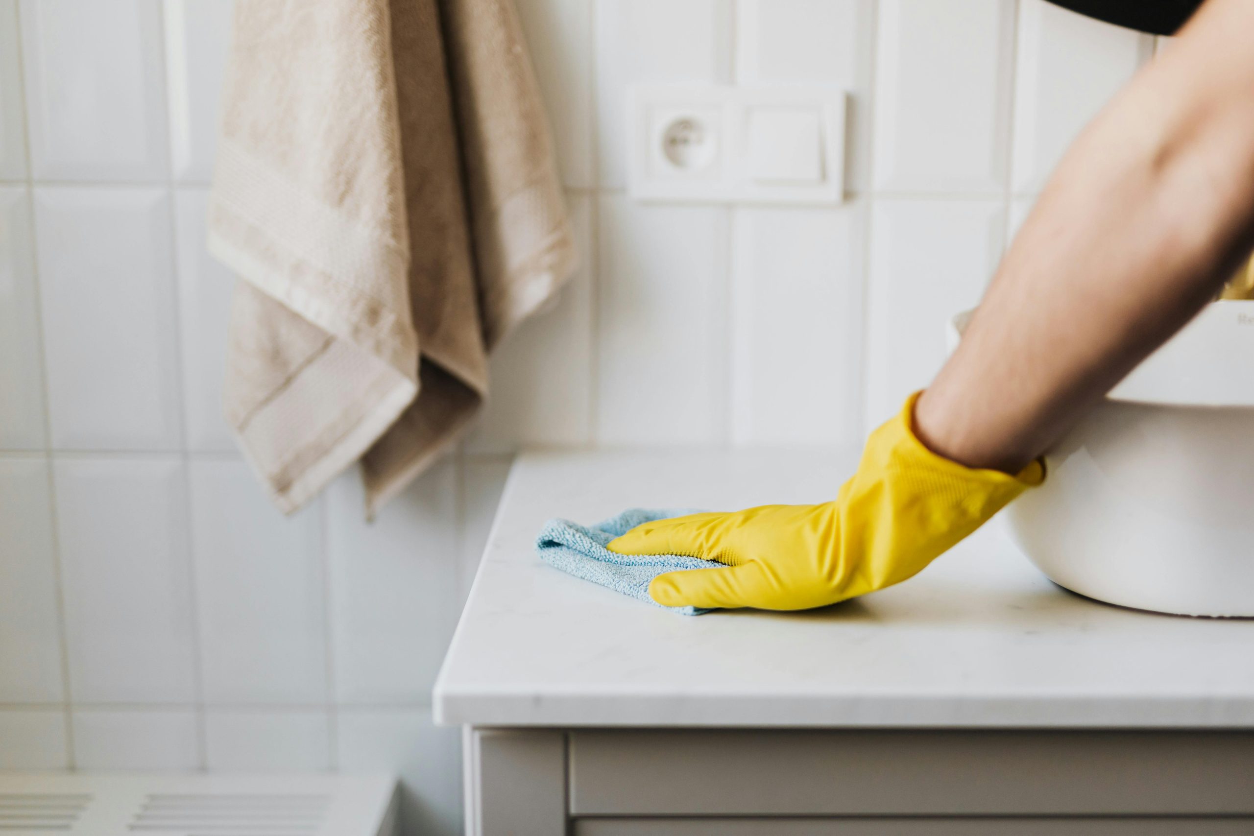 Person cleaning bathroom