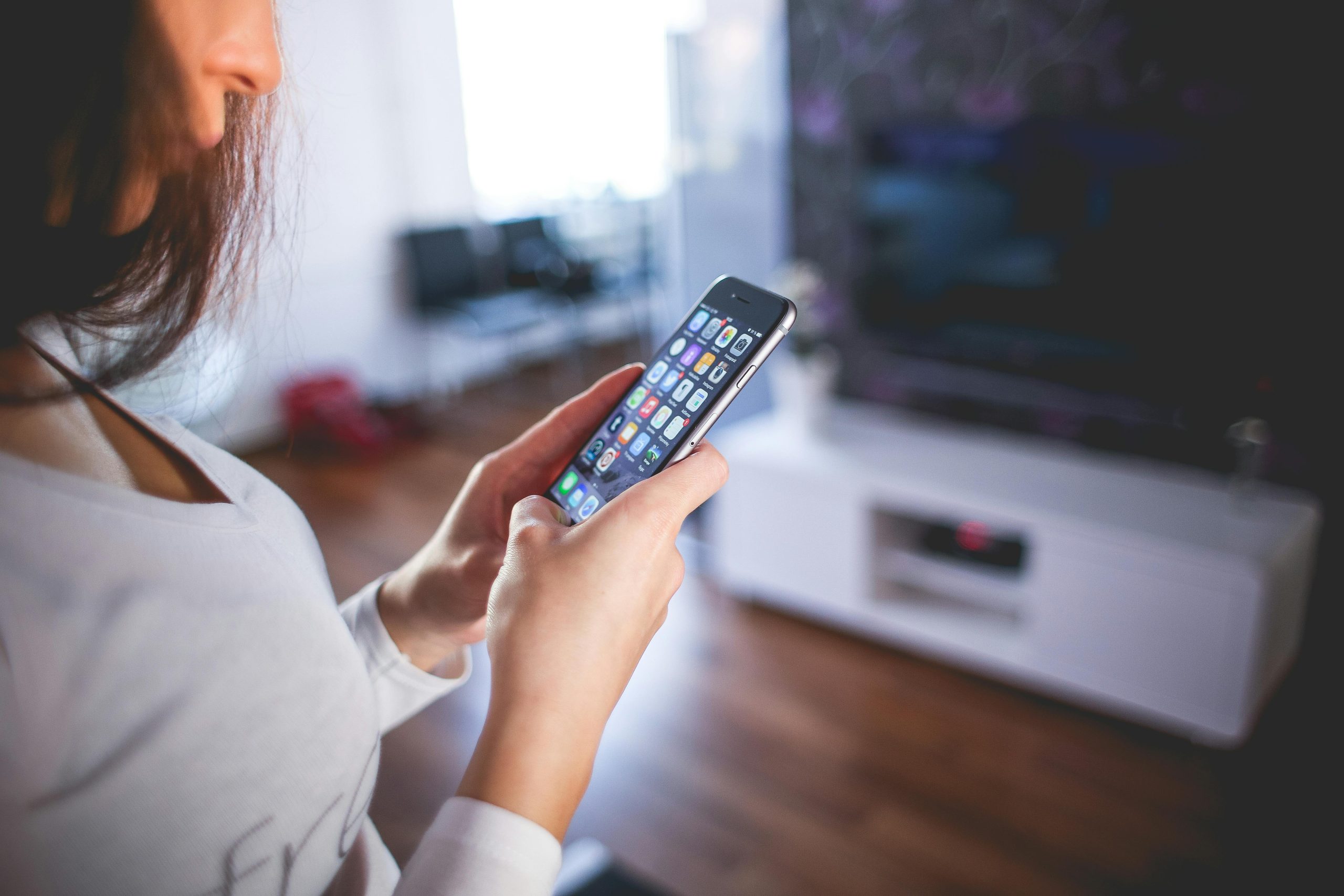 woman on her smart phone