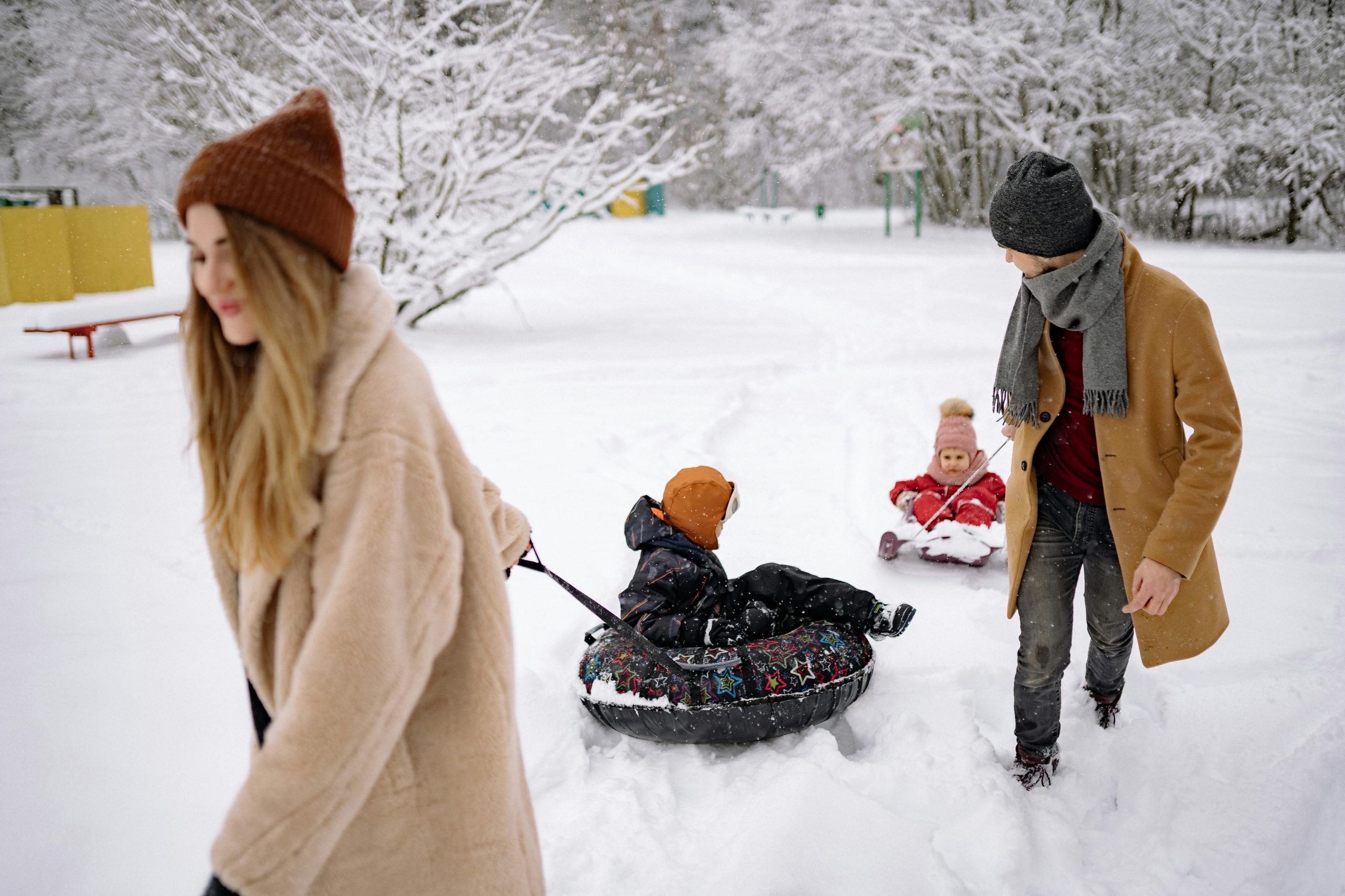 A family playing in the snow